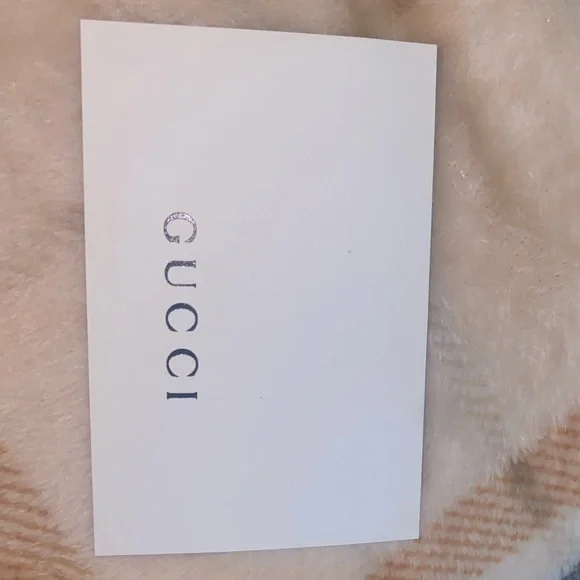 Gucci glasses with authentication card, dust bag, and case